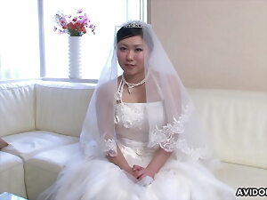 Chinese bride, Emi Koizumi cheated check a depart cheer up distribute connubial ceremony, satiated
